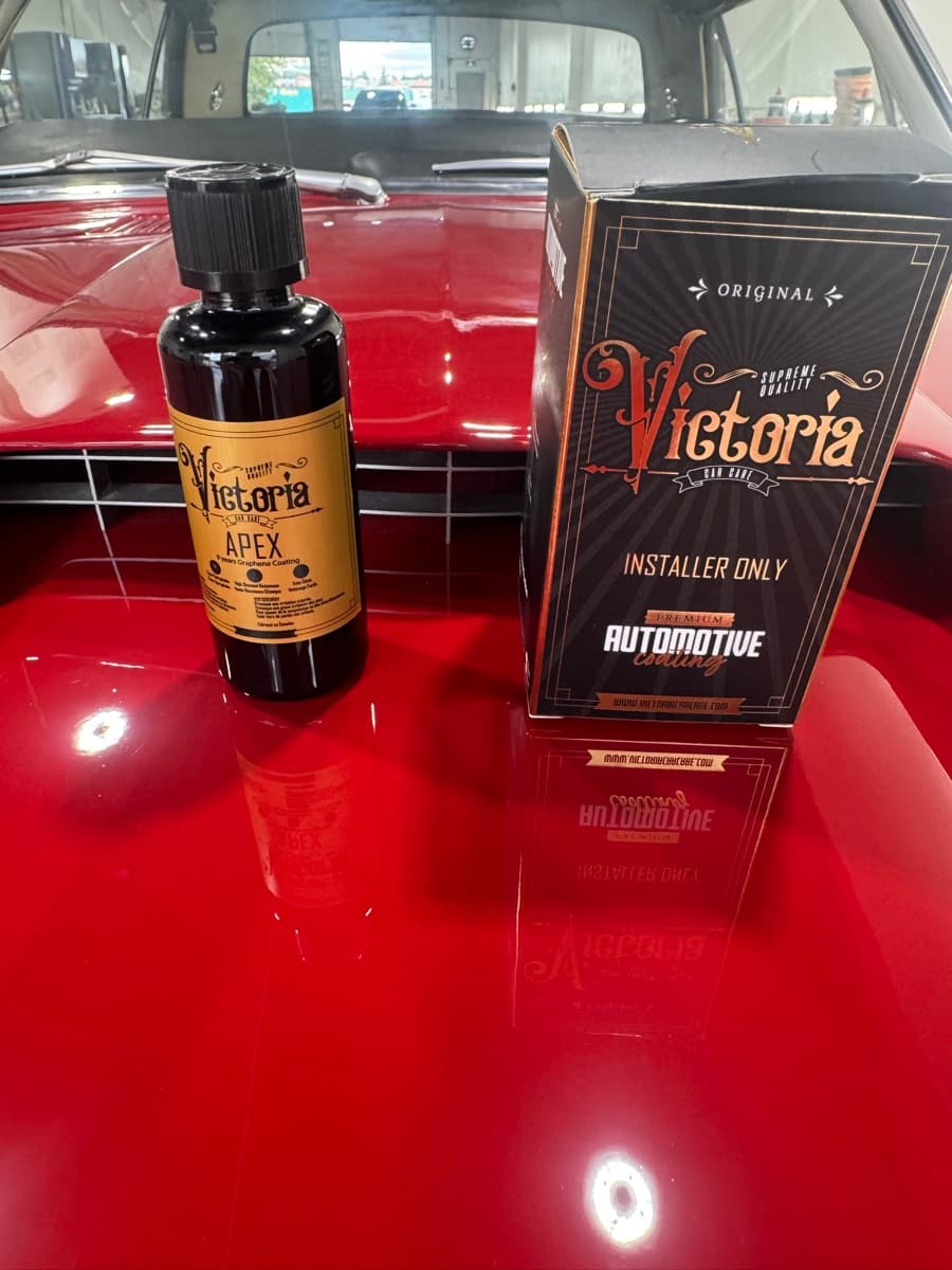 Close-up of ceramic coating showing hydrophobic water beading on vehicle surface