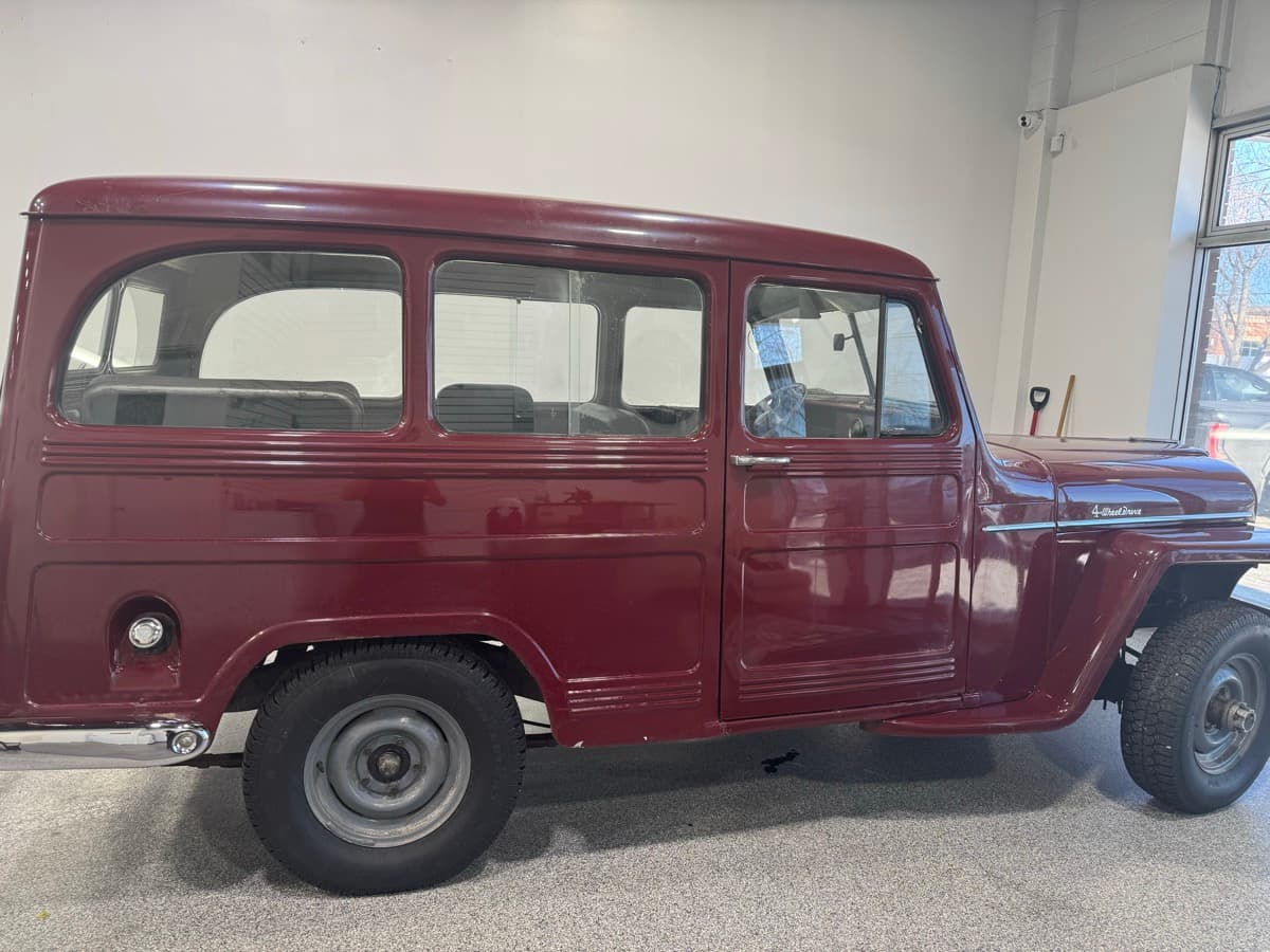 Burgundy vintage Willys wagon with full exterior detail and polished paint finish