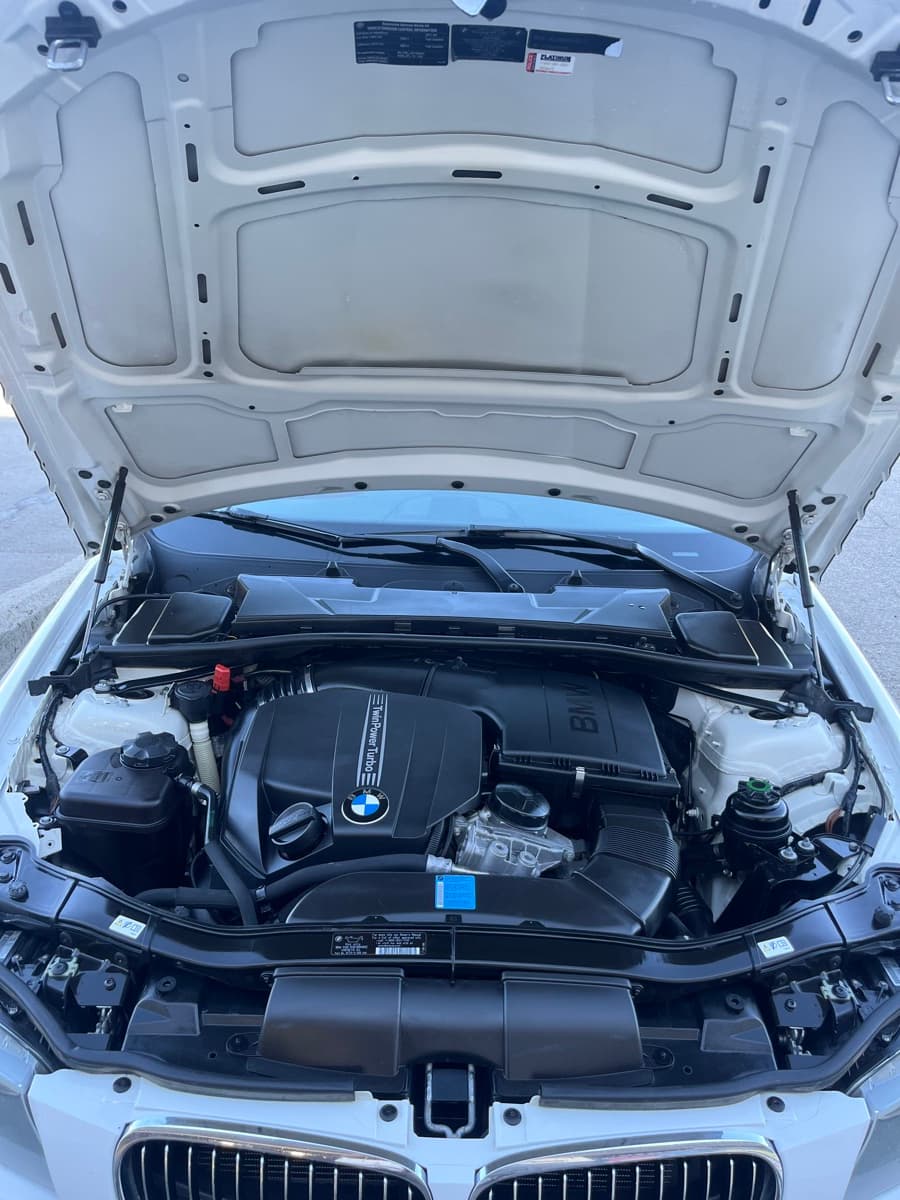 Clean engine bay after professional engine compartment detail at 2Clean Inc.